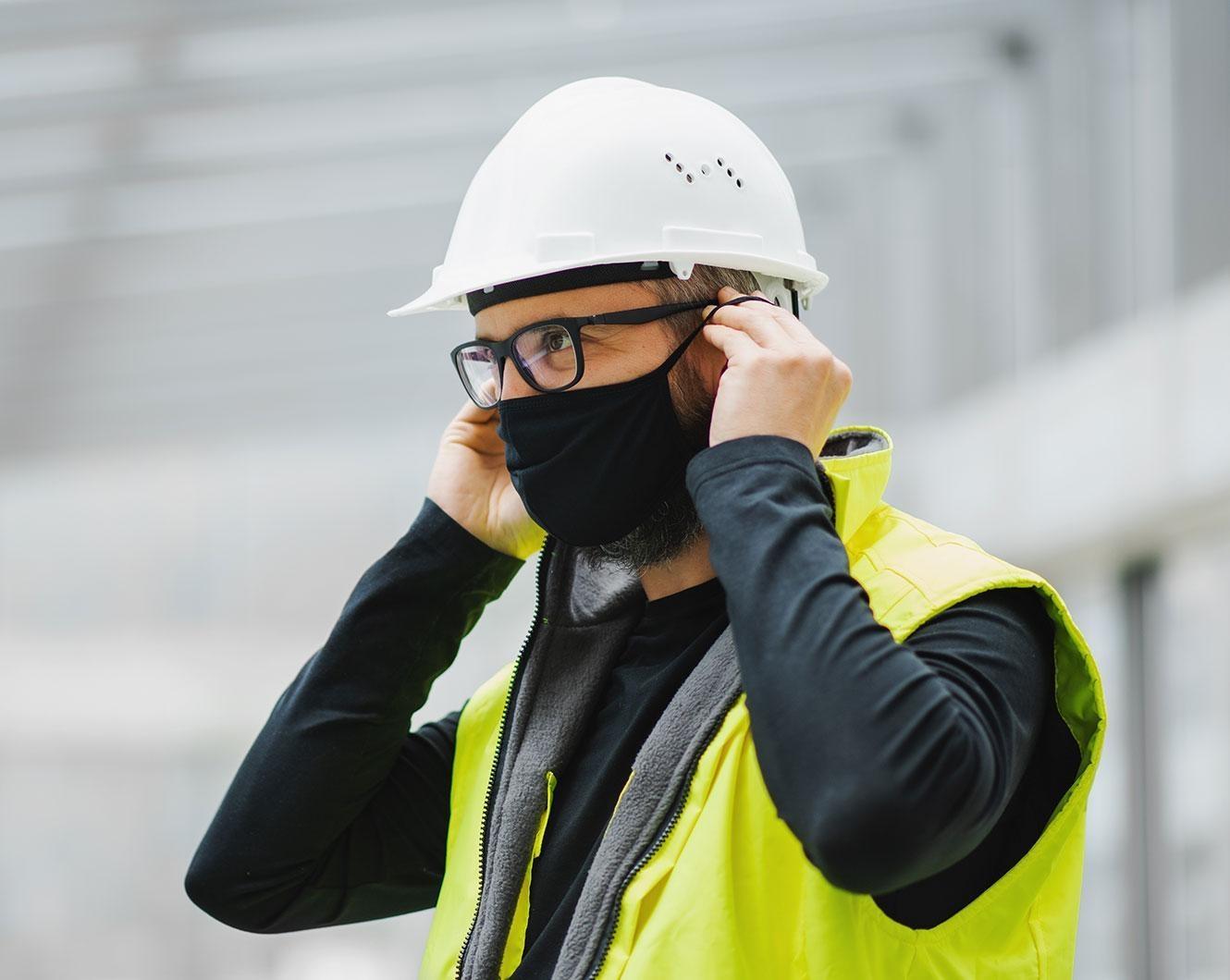 home surveyor wearing a mask 